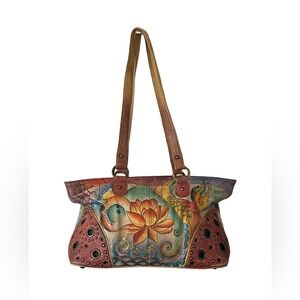 Anuschka hand-painted leather lotus flower fish design with studs and grommets